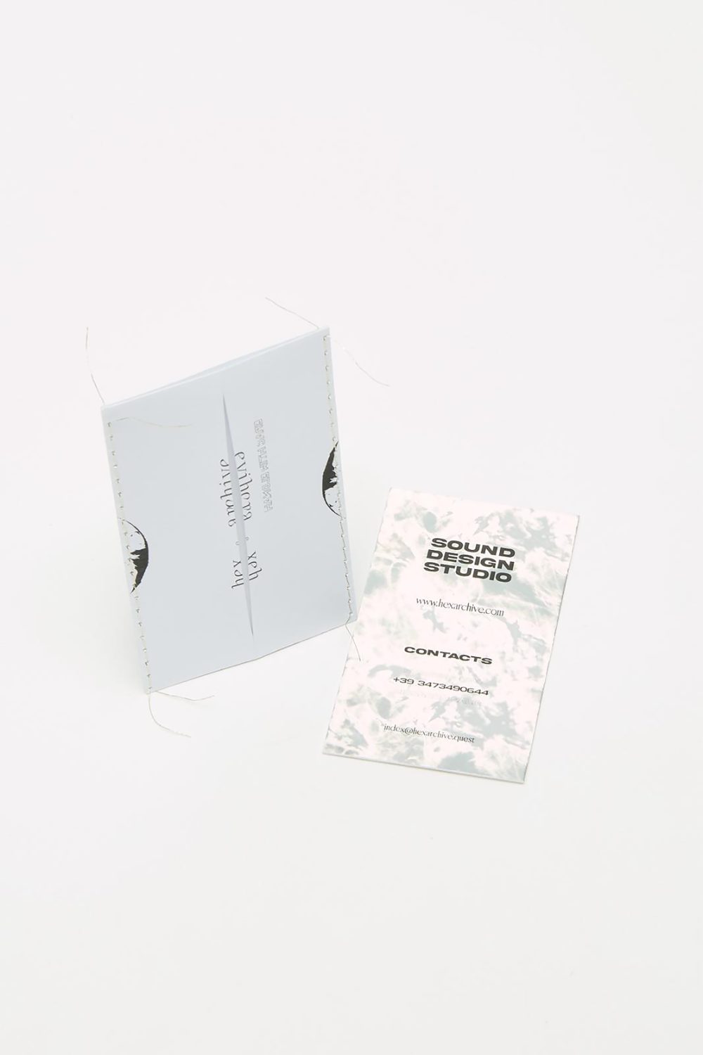 Sleeve and front card laid flat, seen at an angle
